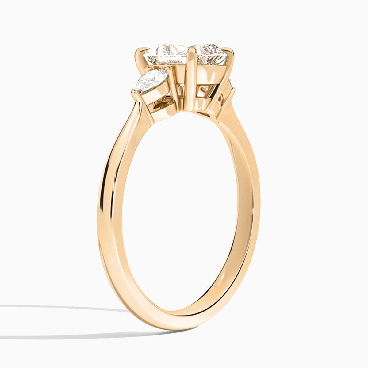 Radiant Petite Three Stone Lab Diamond Engagement Ring In 14K Rose Gold, Angle View