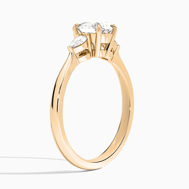 Round Petite Three Stone Lab Diamond Engagement Ring In 14K Rose Gold, Angle View
