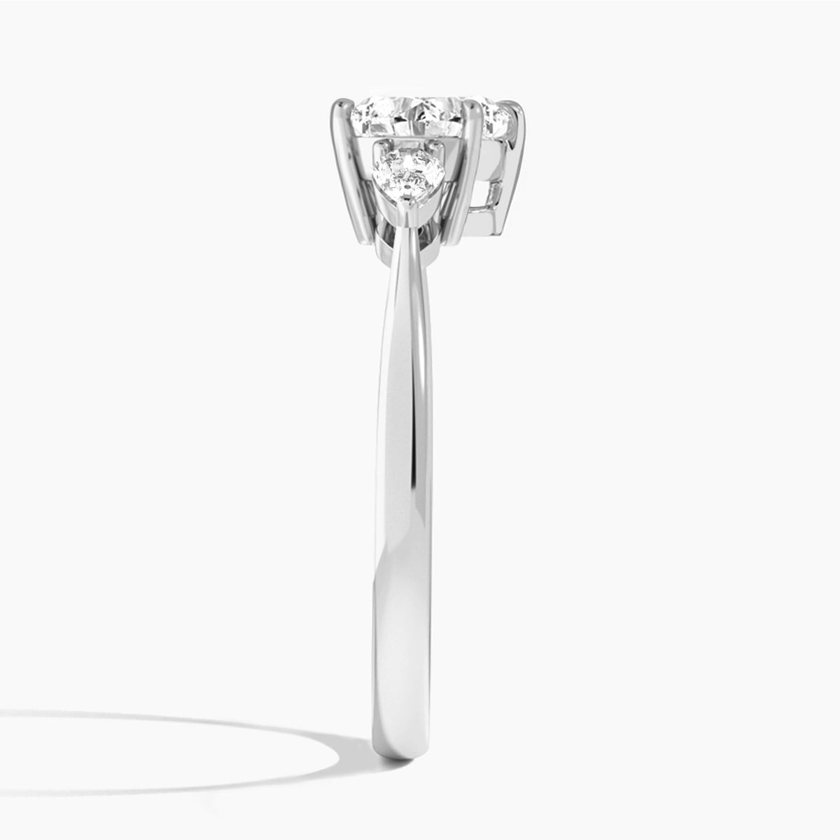 Heart Petite Three Stone Lab Diamond Engagement Ring In 18K White Gold, Side View