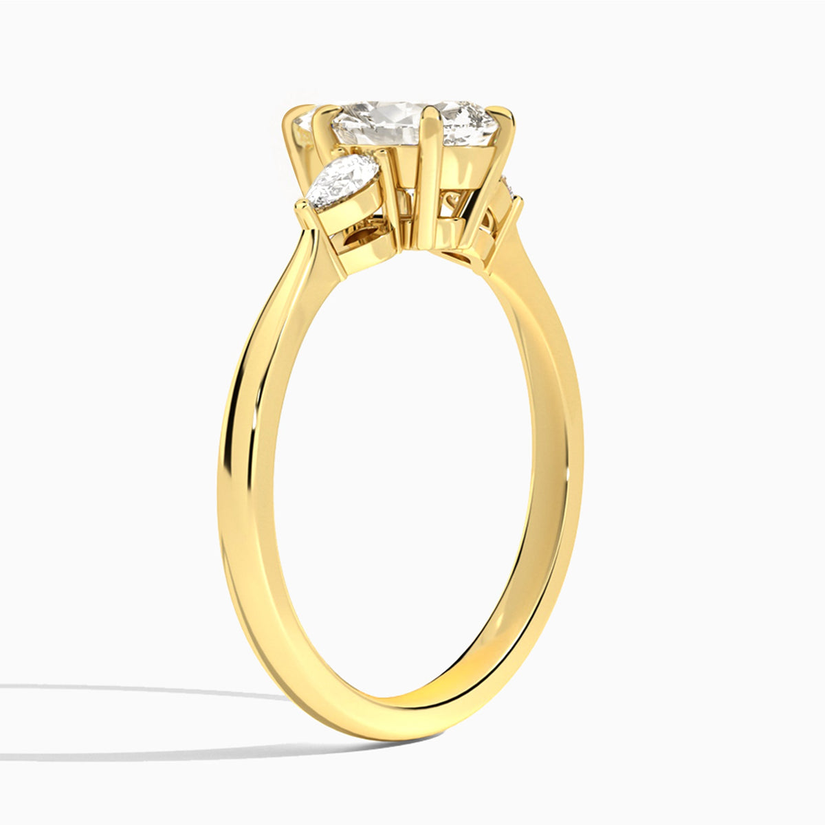 Pear Petite Three Stone Lab Diamond Engagement Ring In 18K Yellow Gold, Angle View