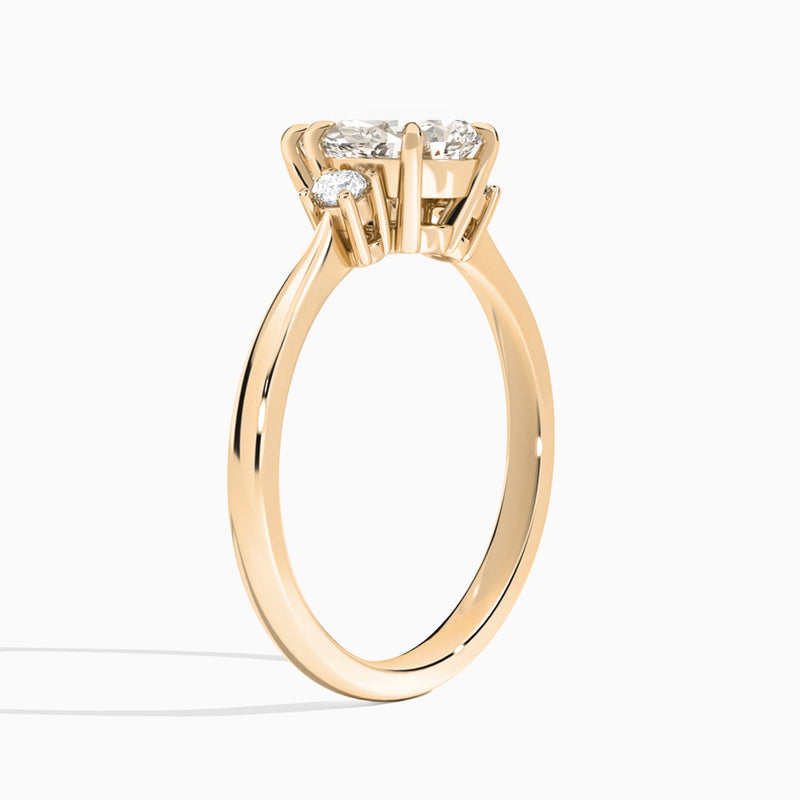 Pear Mona Three Stone Lab Diamond Engagement Ring In 14K Rose Gold, Angle View