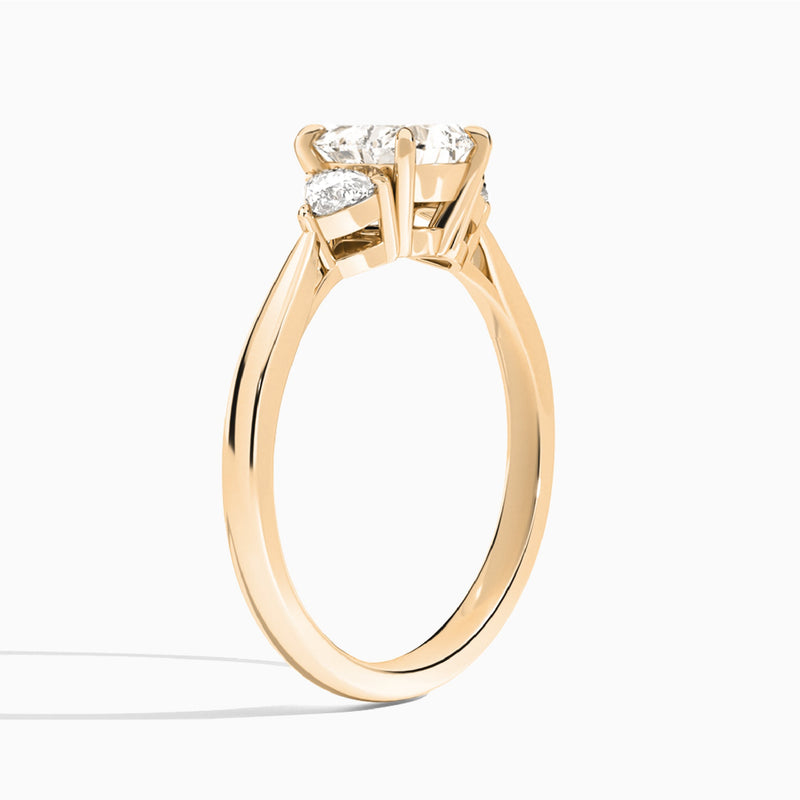 Heart Luxe Trillion Cut Three Stone Lab Diamond Engagement Ring In 14K Rose Gold, Angle View