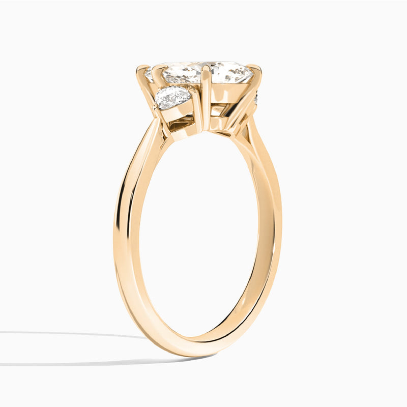 Marquise Luxe Trillion Cut Three Stone Lab Diamond Engagement Ring In 14K Rose Gold, Angle View