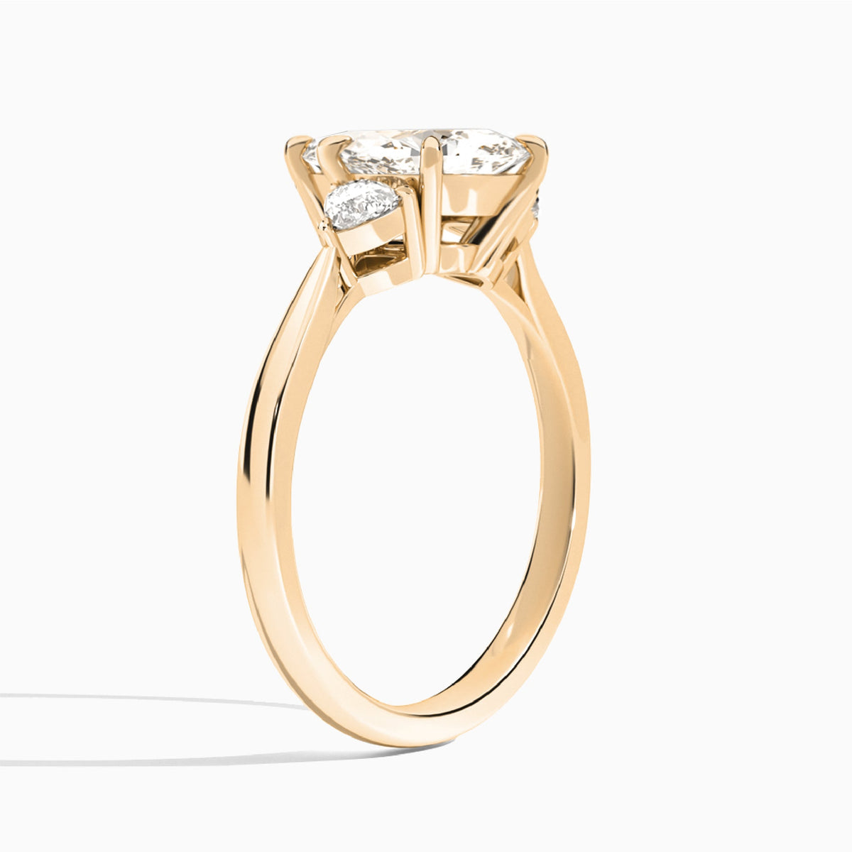 Marquise Luxe Trillion Cut Three Stone Lab Diamond Engagement Ring In 14K Rose Gold, Angle View