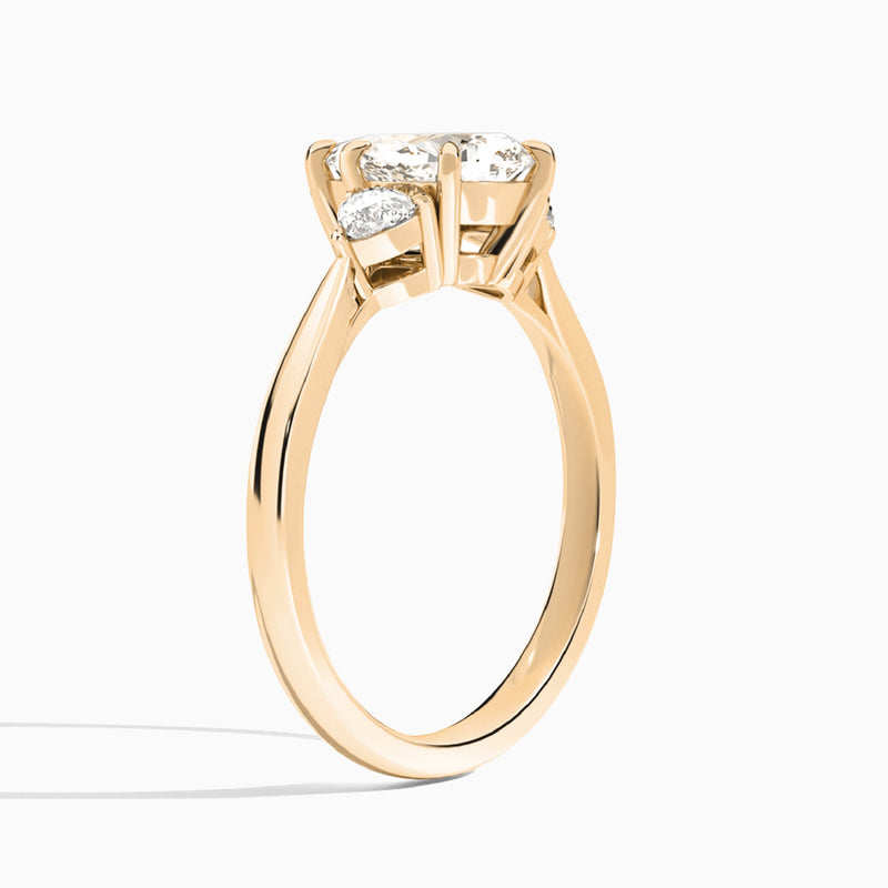 Pear Luxe Trillion Cut Three Stone Lab Diamond Engagement Ring In 14K Rose Gold, Angle View