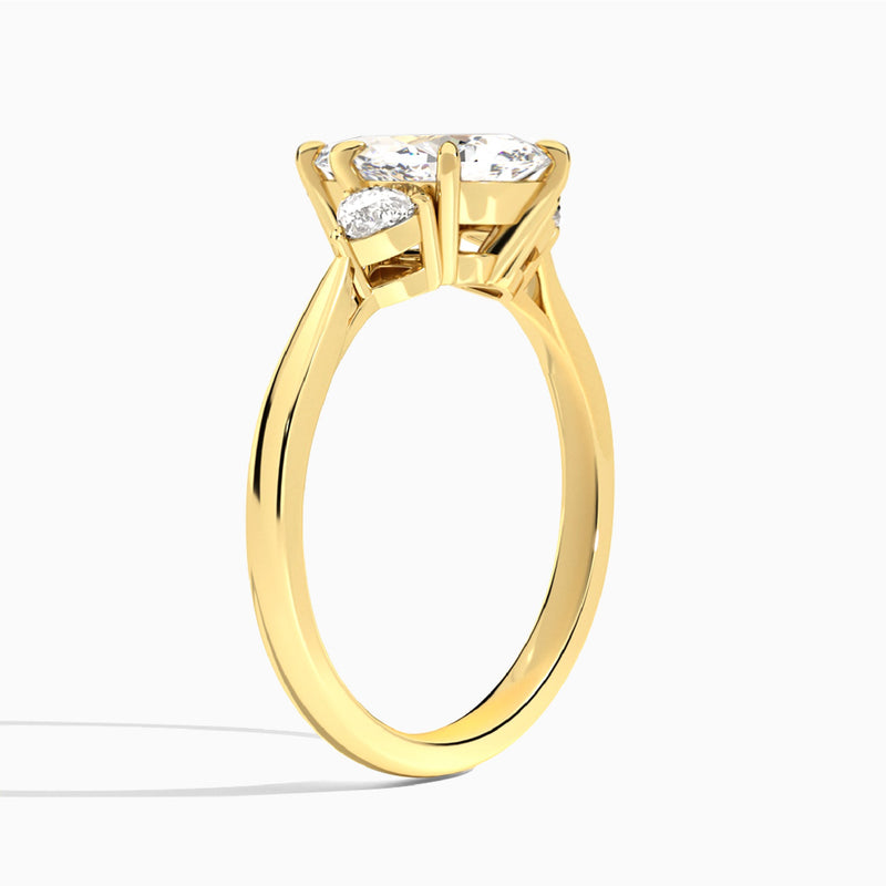 Marquise Luxe Trillion Cut Three Stone Lab Diamond Engagement Ring In 14K Yellow Gold, Angle View