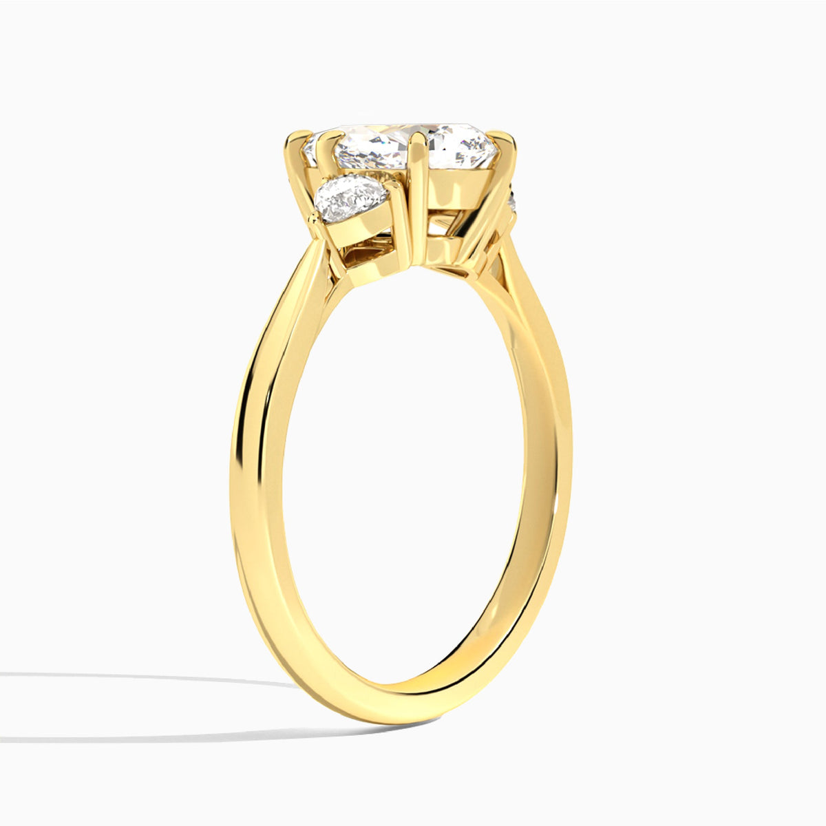 Pear Luxe Trillion Cut Three Stone Lab Diamond Engagement Ring In 18K Yellow Gold, Angle View