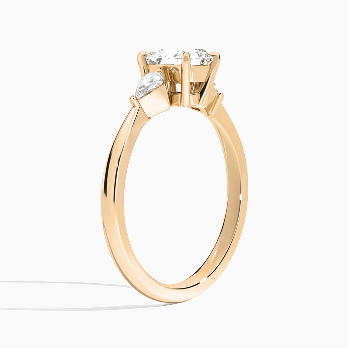 Asscher Luxe Ciana Three Stone Lab Diamond Engagement Ring In 14K Rose Gold, Angle View