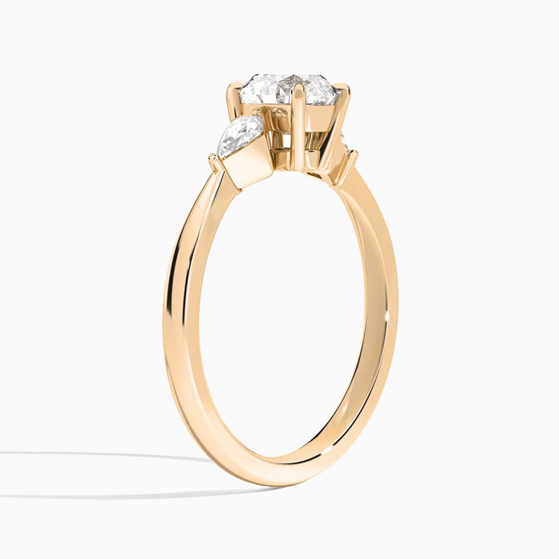 Round Luxe Ciana Three Stone Lab Diamond Engagement Ring In 14K Rose Gold, Angle View