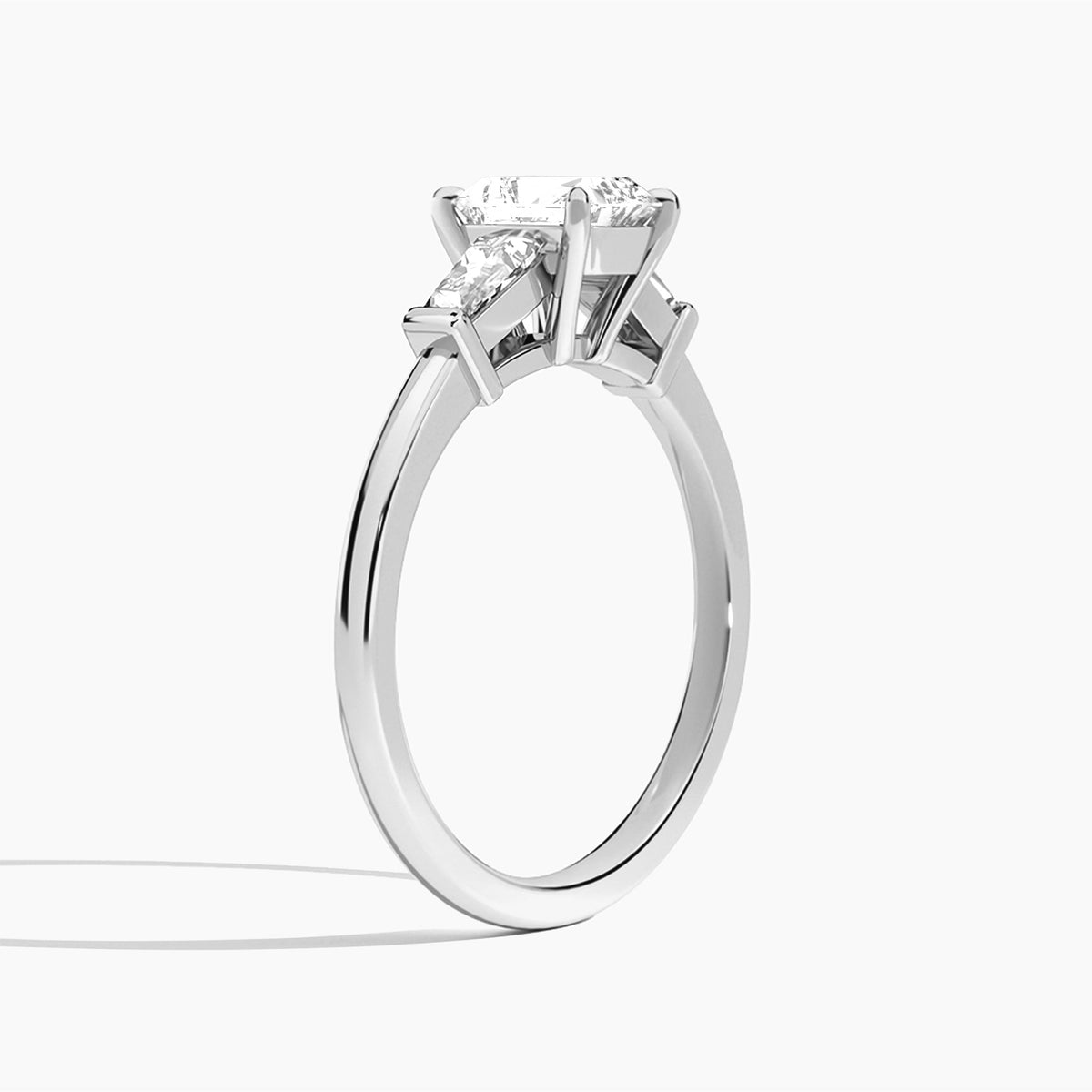 Radiant Thora Three Stone Lab Grown Diamond Engagement Ring In Platinum, Angle View