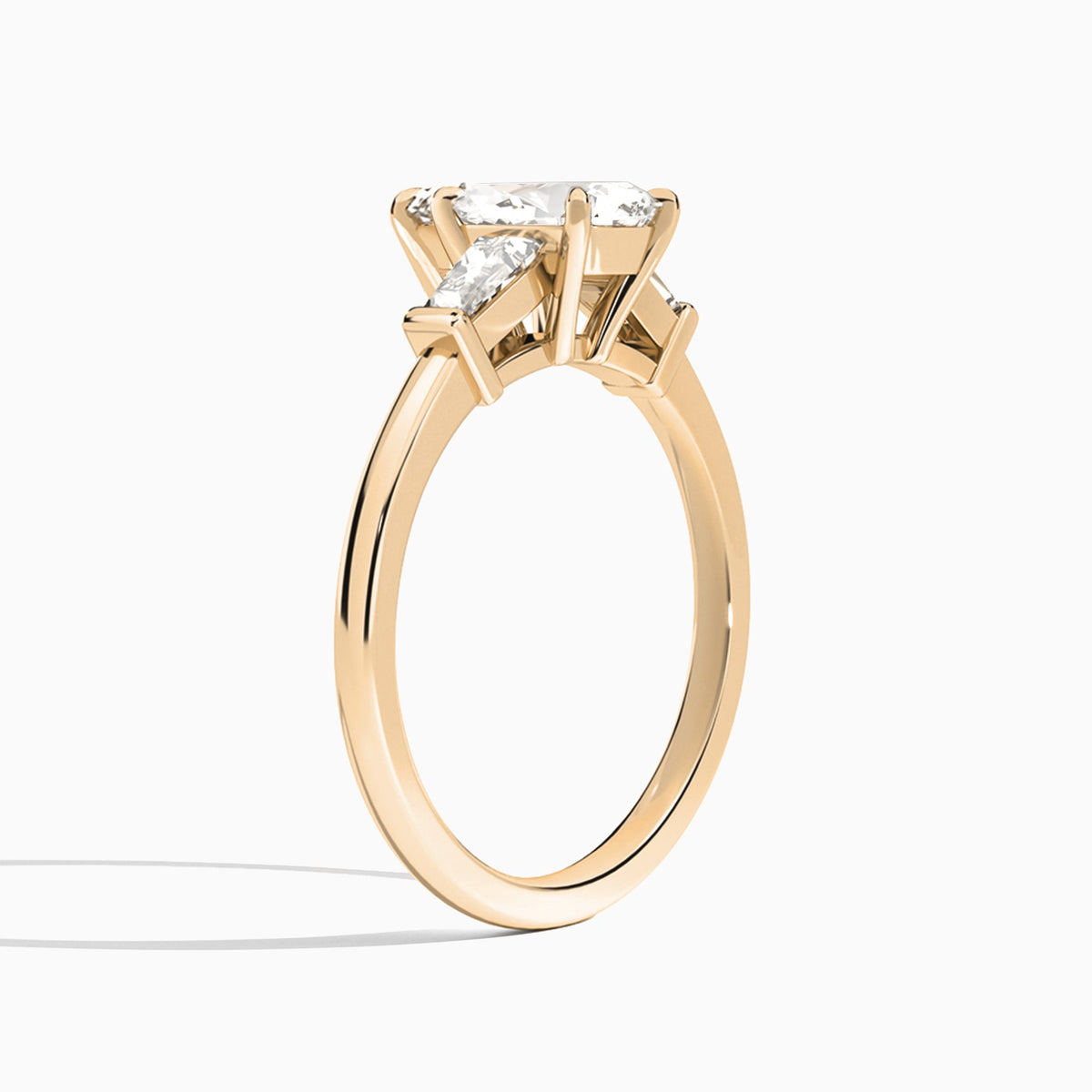 Pear Thora Three Stone Lab Diamond Engagement Ring In 14K Rose Gold, Angle View