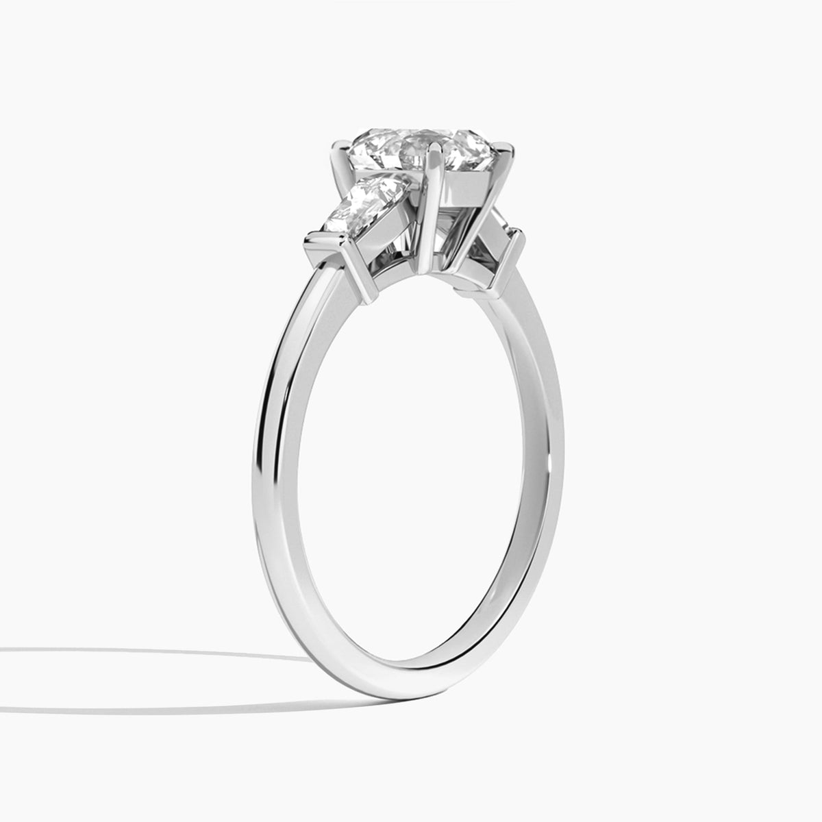 Round Thora Three Stone Lab Diamond Engagement Ring In 18K White Gold, Angle View