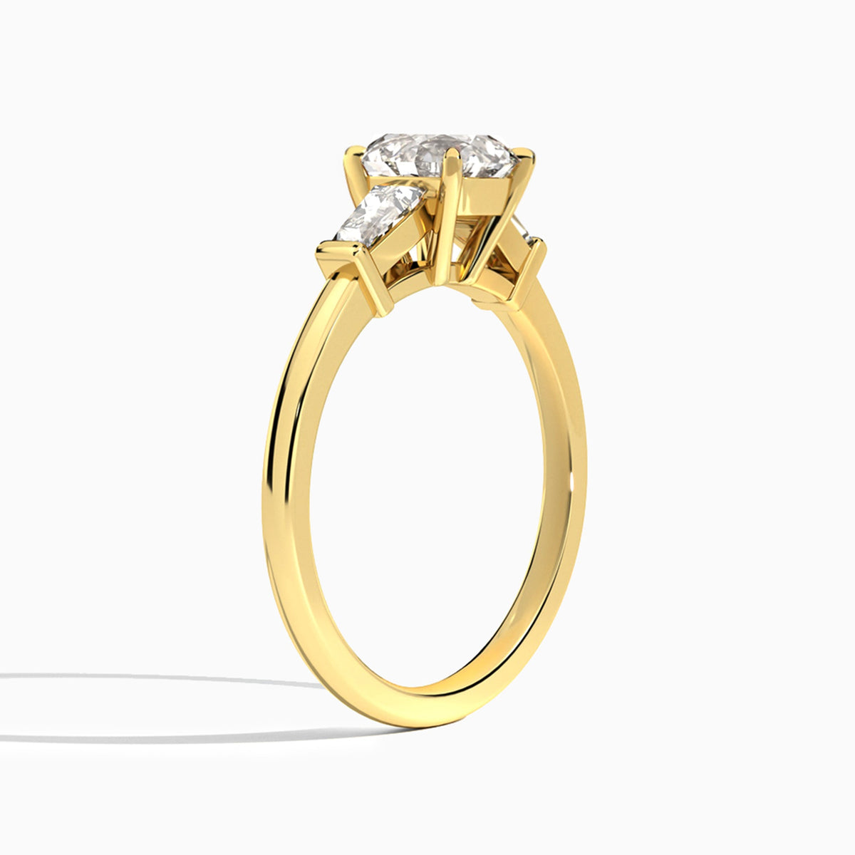Round Thora Three Stone Lab Diamond Engagement Ring In 18K Yellow Gold, Angle View