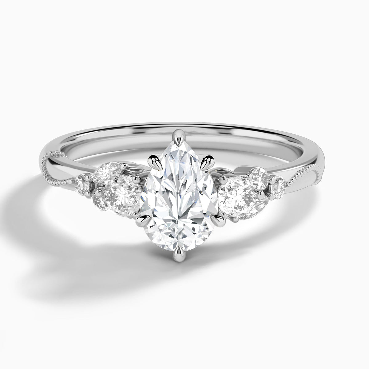 Pear Carnation Three Stone Lab Diamond Engagement Ring In Platinum - Lucenjuri