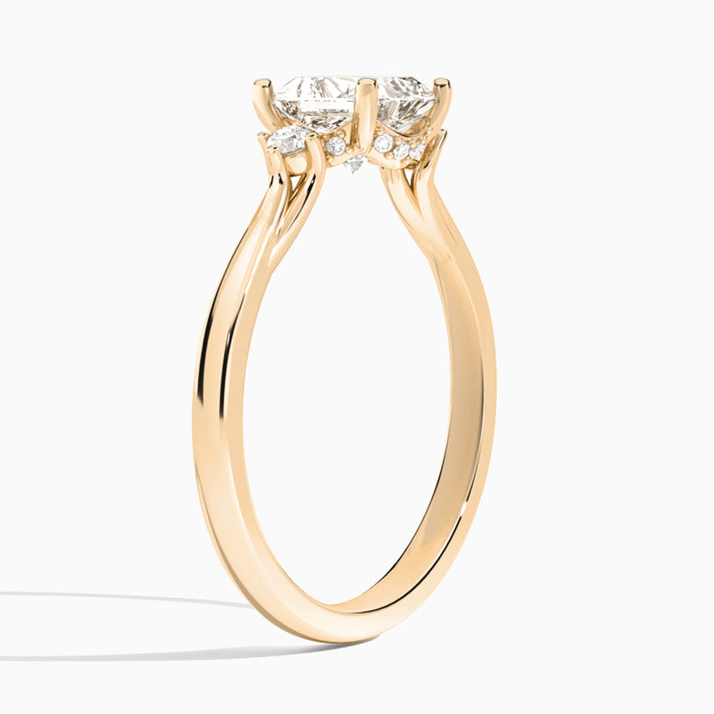 Radiant Floating Three Stone Lab Diamond Engagement Ring In 14K Rose Gold, Angle View