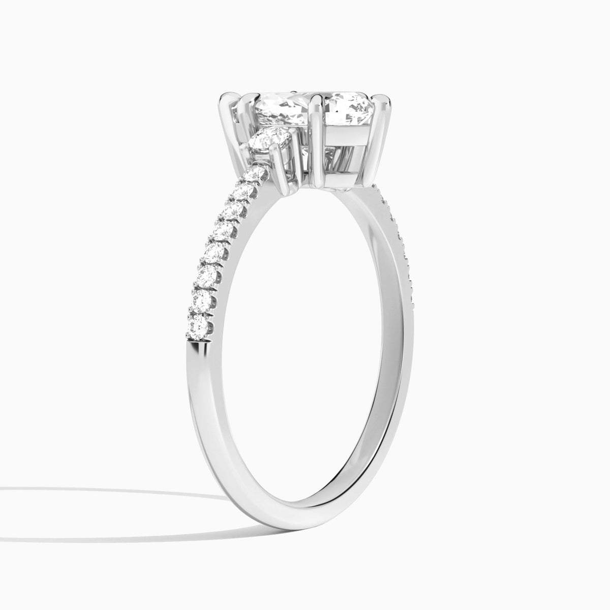 Pear Muse Three Stone Lab Grown Diamond Engagement Ring In Platinum, Angle View
