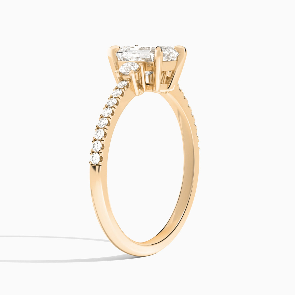 Emerald Muse Three Stone Lab Diamond Engagement Ring In 14K Rose Gold, Angle View