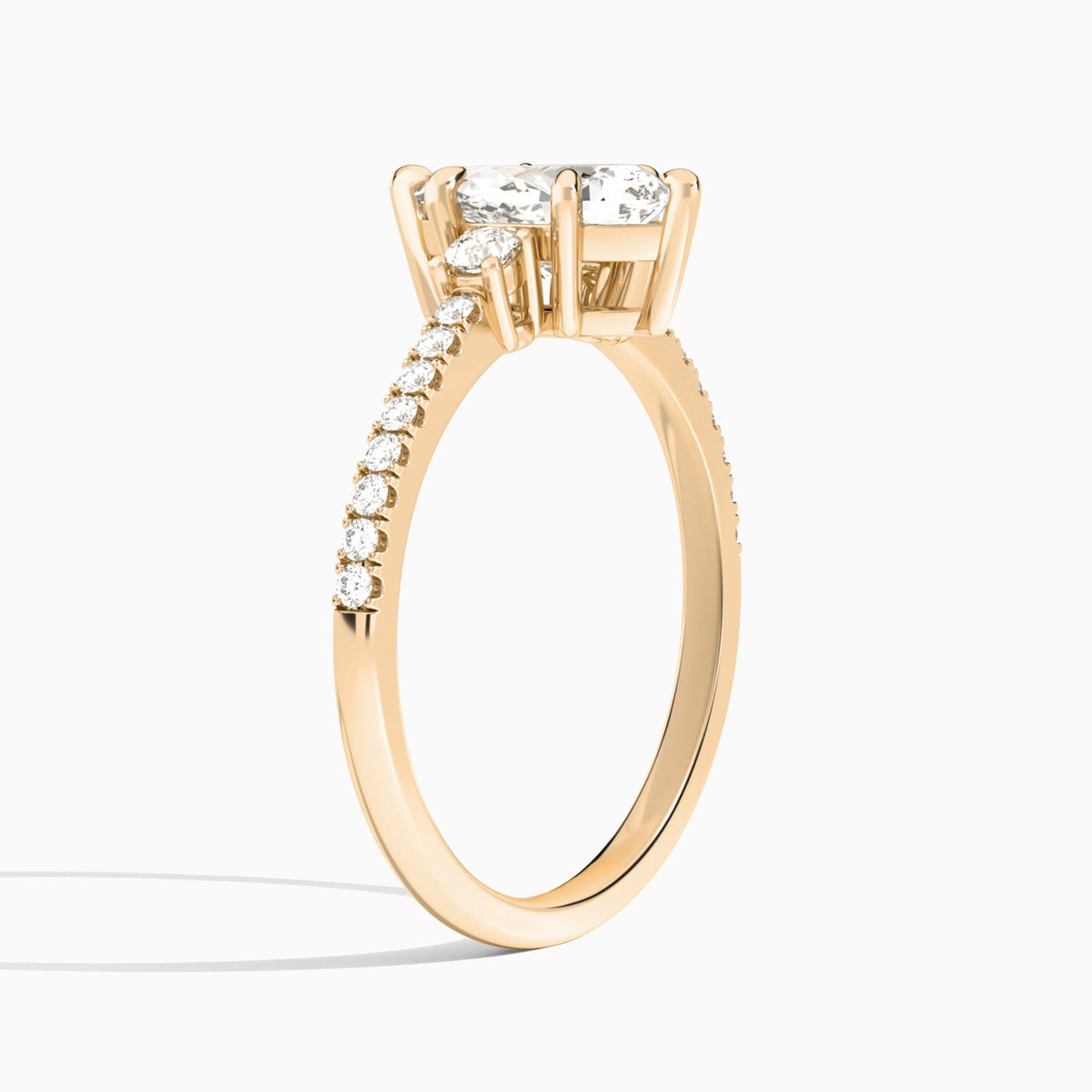 Pear Muse Three Stone Lab Diamond Engagement Ring In 14K Rose Gold, Angle View