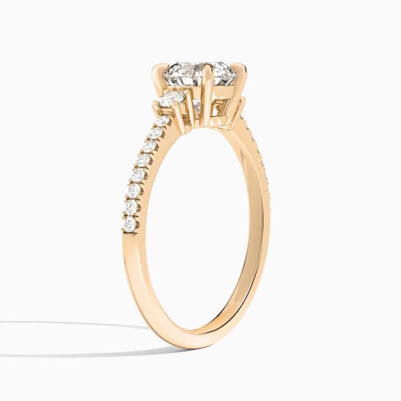 Round Muse Three Stone Lab Diamond Engagement Ring In 14K Rose Gold, Angle View