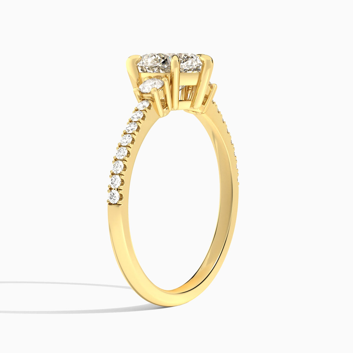 Heart Muse Three Stone Lab Diamond Engagement Ring In 18K Yellow Gold, Angle View