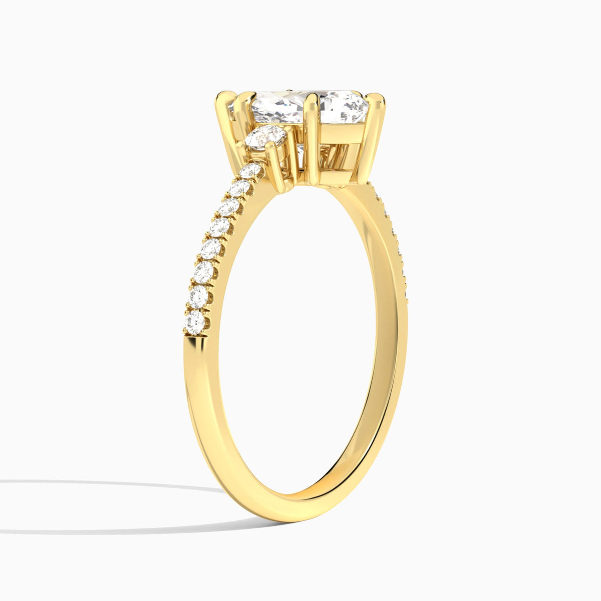 Pear Muse Three Stone Lab Diamond Engagement Ring In 18K Yellow Gold, Angle View