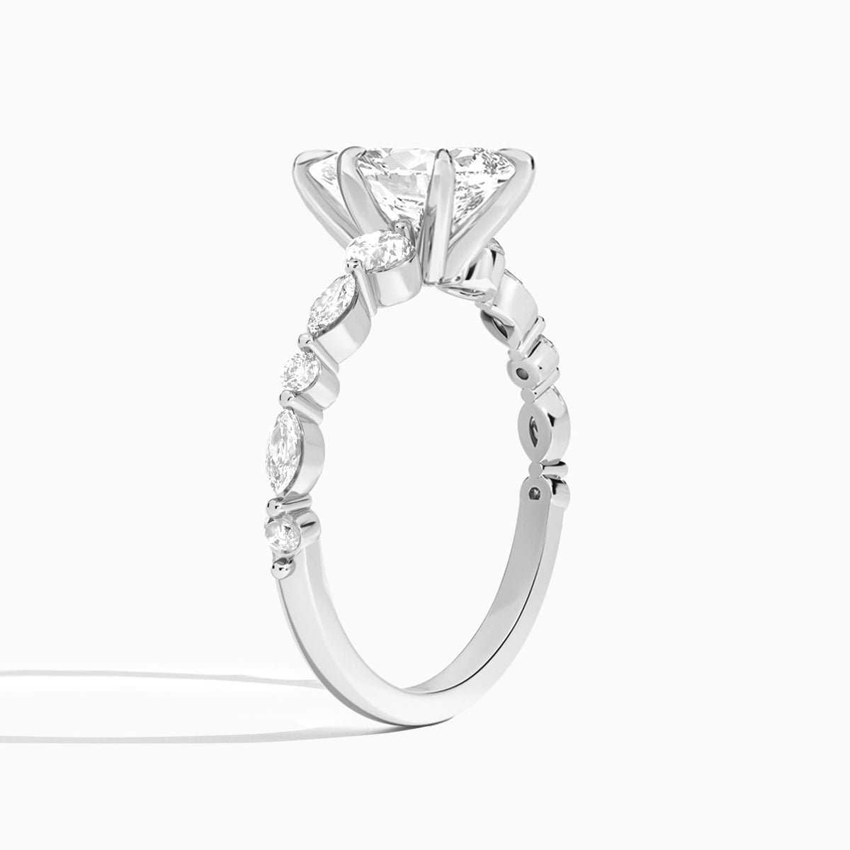 Pear Chateau Three Stone Lab Grown Diamond Engagement Ring In Platinum, Angle View