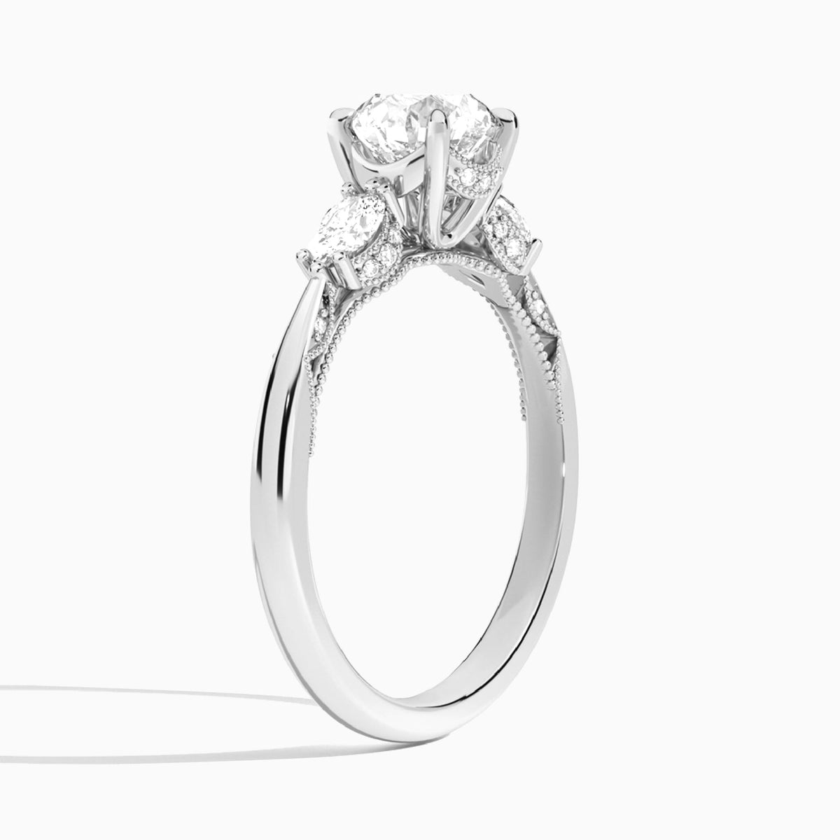 Round Three Stone Marquise Lab Diamond Engagement Ring In 18K White Gold, Angle View