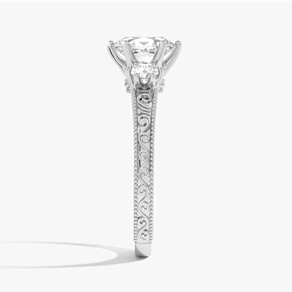 Oval Three Stone Engraved Lab Diamond Engagement Ring In Platinum, Side View