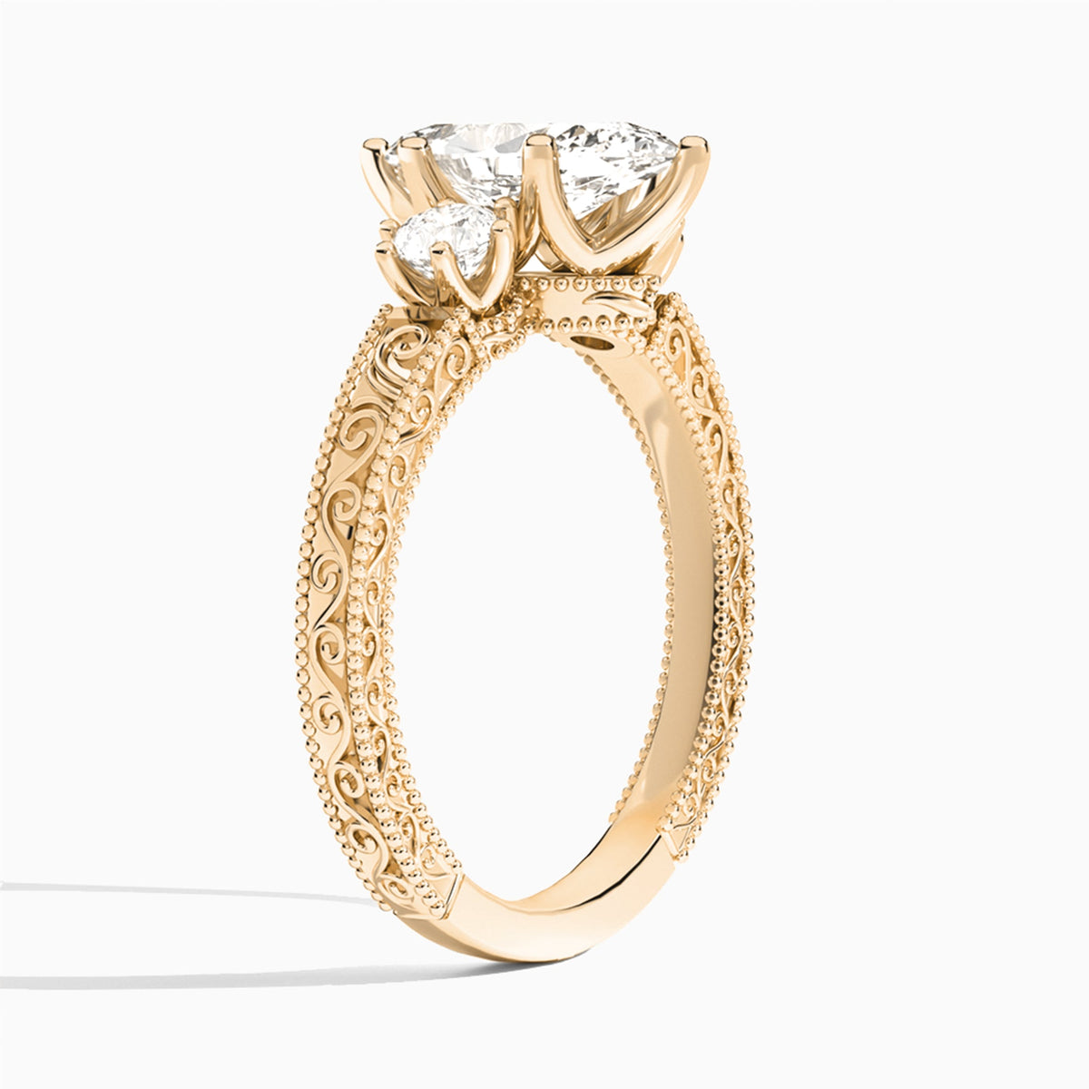 Marquise Three Stone Engraved Lab Diamond Engagement Ring In 14K Rose Gold, Angle View