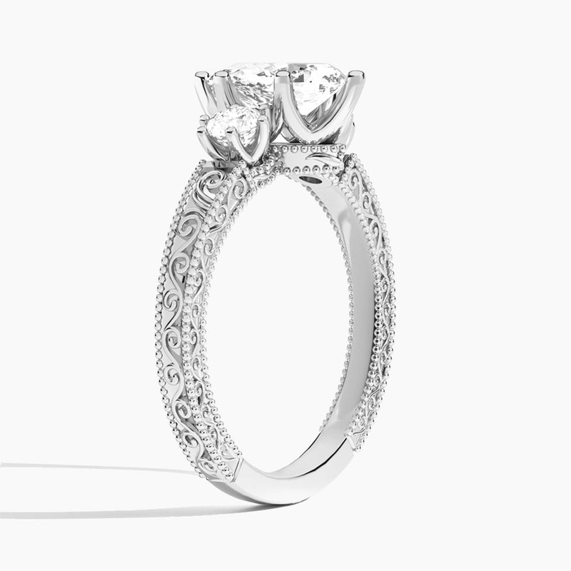 Pear Three Stone Engraved Lab Diamond Engagement Ring In 18K White Gold, Angle View
