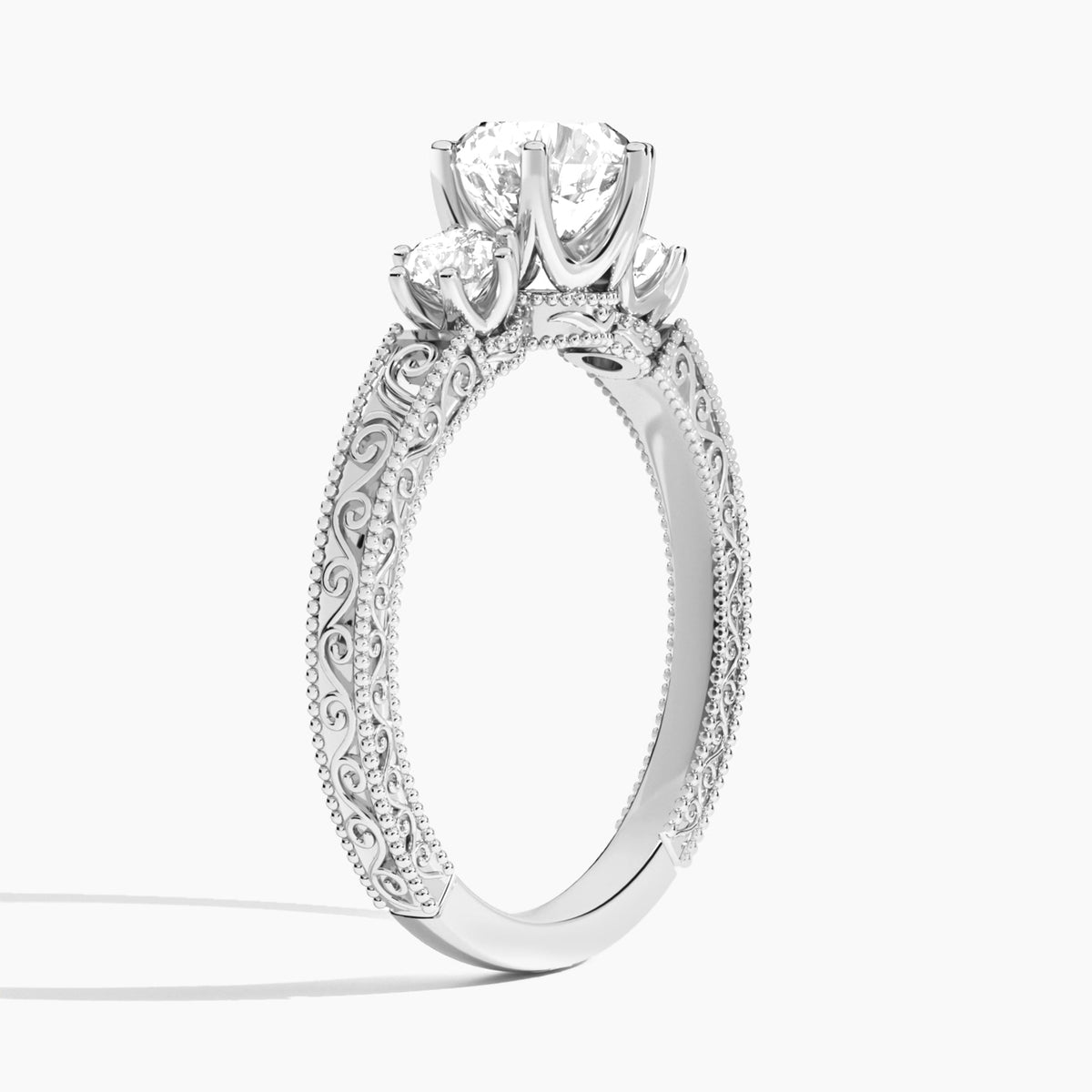 Round Three Stone Engraved Lab Diamond Engagement Ring In 14K White Gold, Angle View
