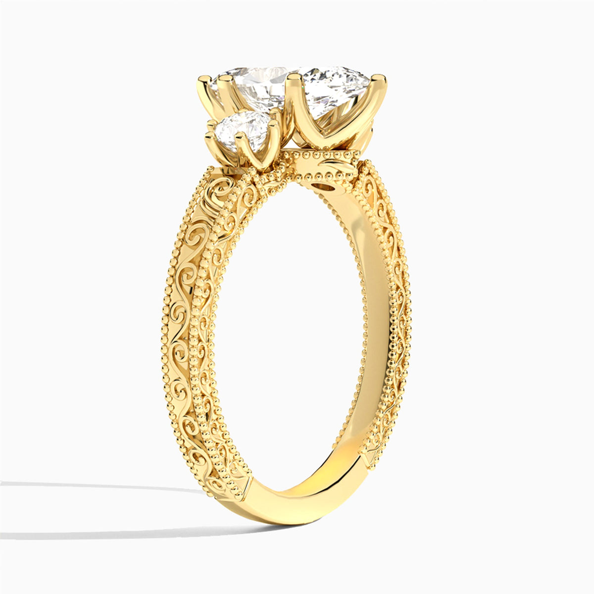 Marquise Three Stone Engraved Lab Diamond Engagement Ring In 14K Yellow Gold, Angle View