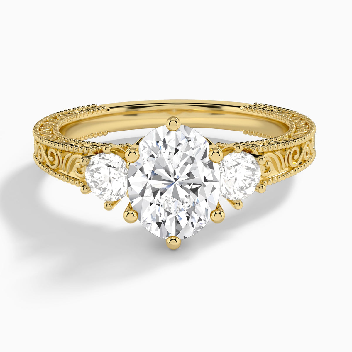 Oval Three Stone Engraved Lab Diamond Engagement Ring In 18K Yellow Gold - Lucenjuri