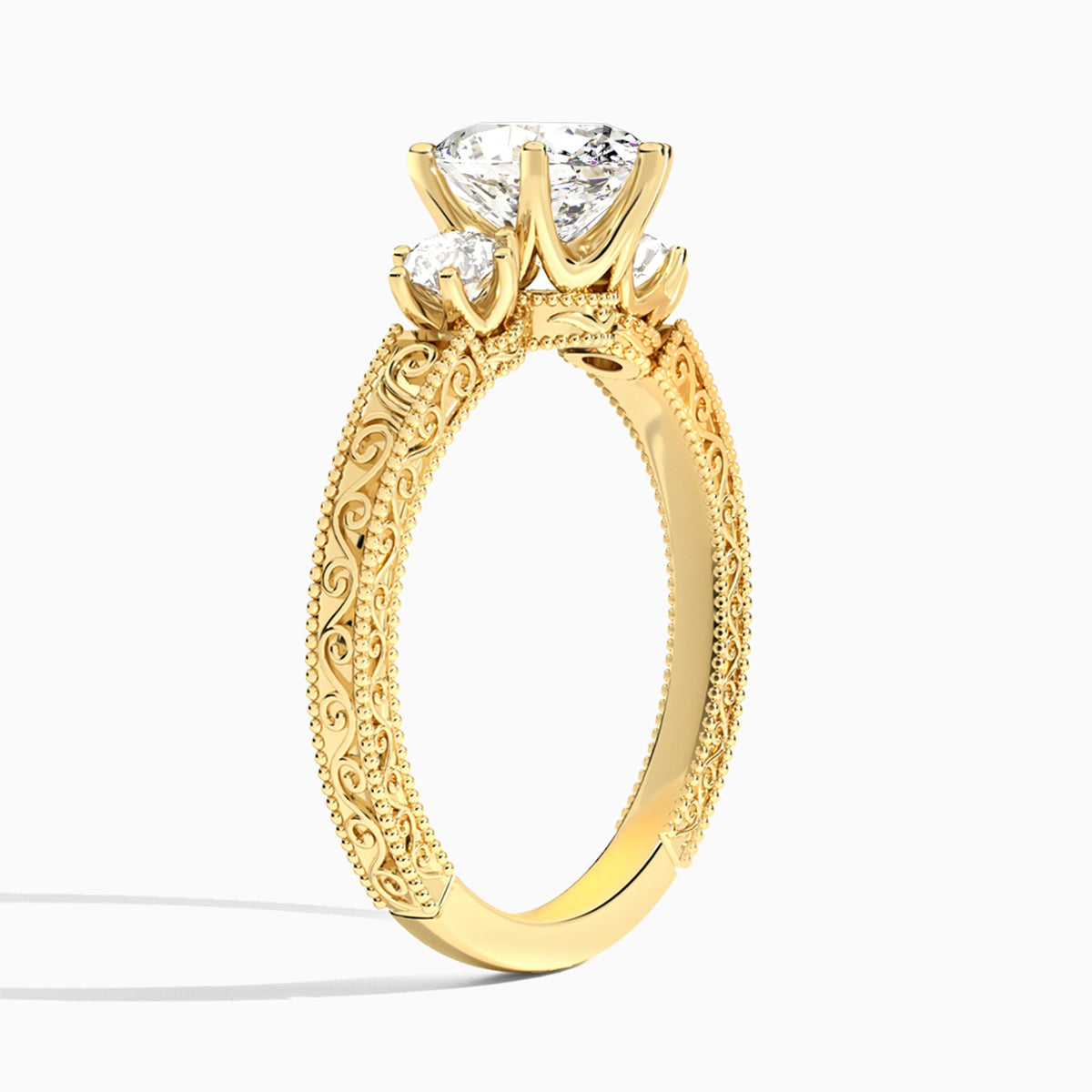 Oval Three Stone Engraved Lab Diamond Engagement Ring In 14K Yellow Gold, Angle View