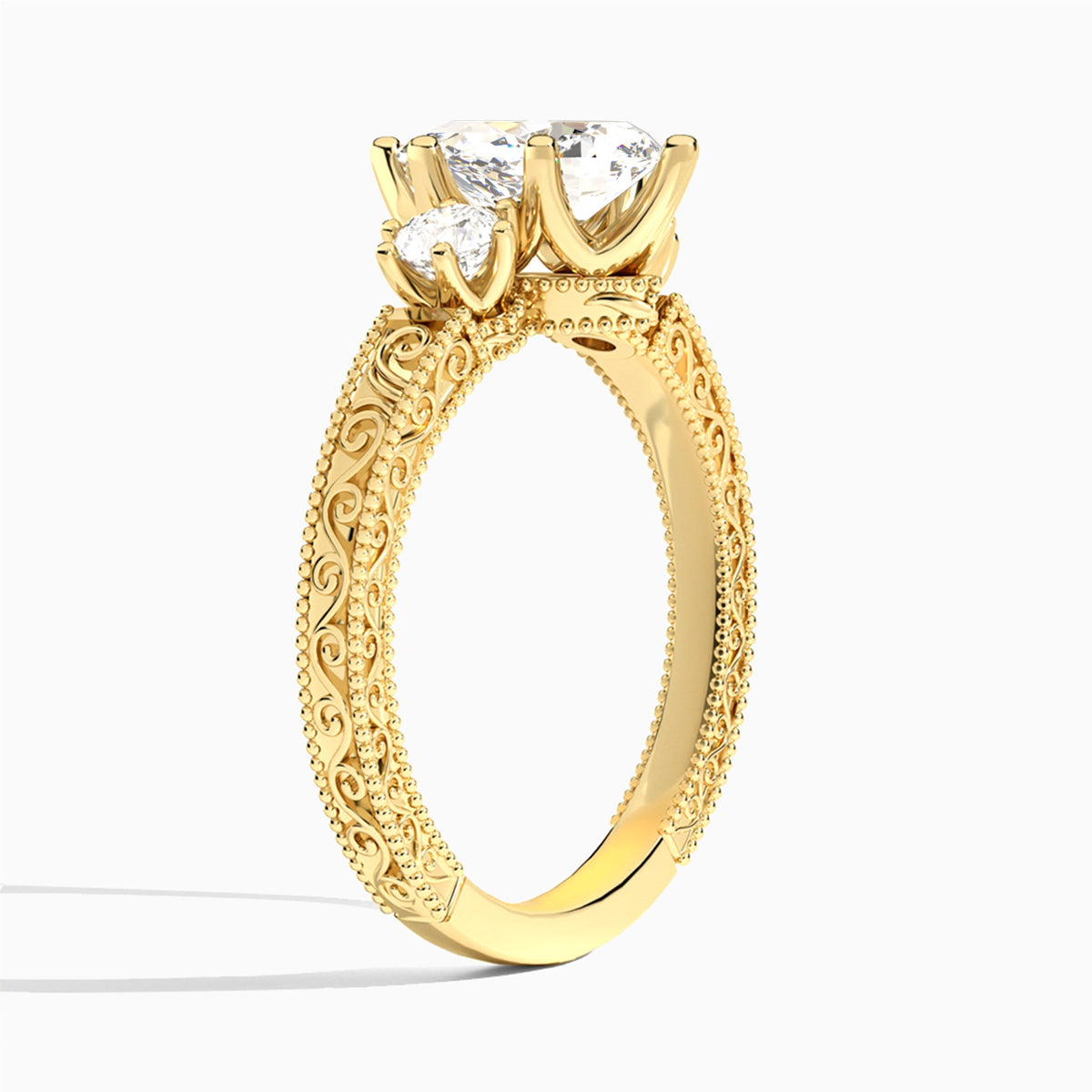 Pear Three Stone Engraved Lab Diamond Engagement Ring In 18K Yellow Gold, Angle View