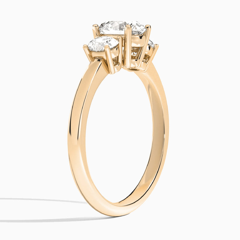 Round Sonata Three Stone Lab Diamond Engagement Ring In 14K Rose Gold, Angle View