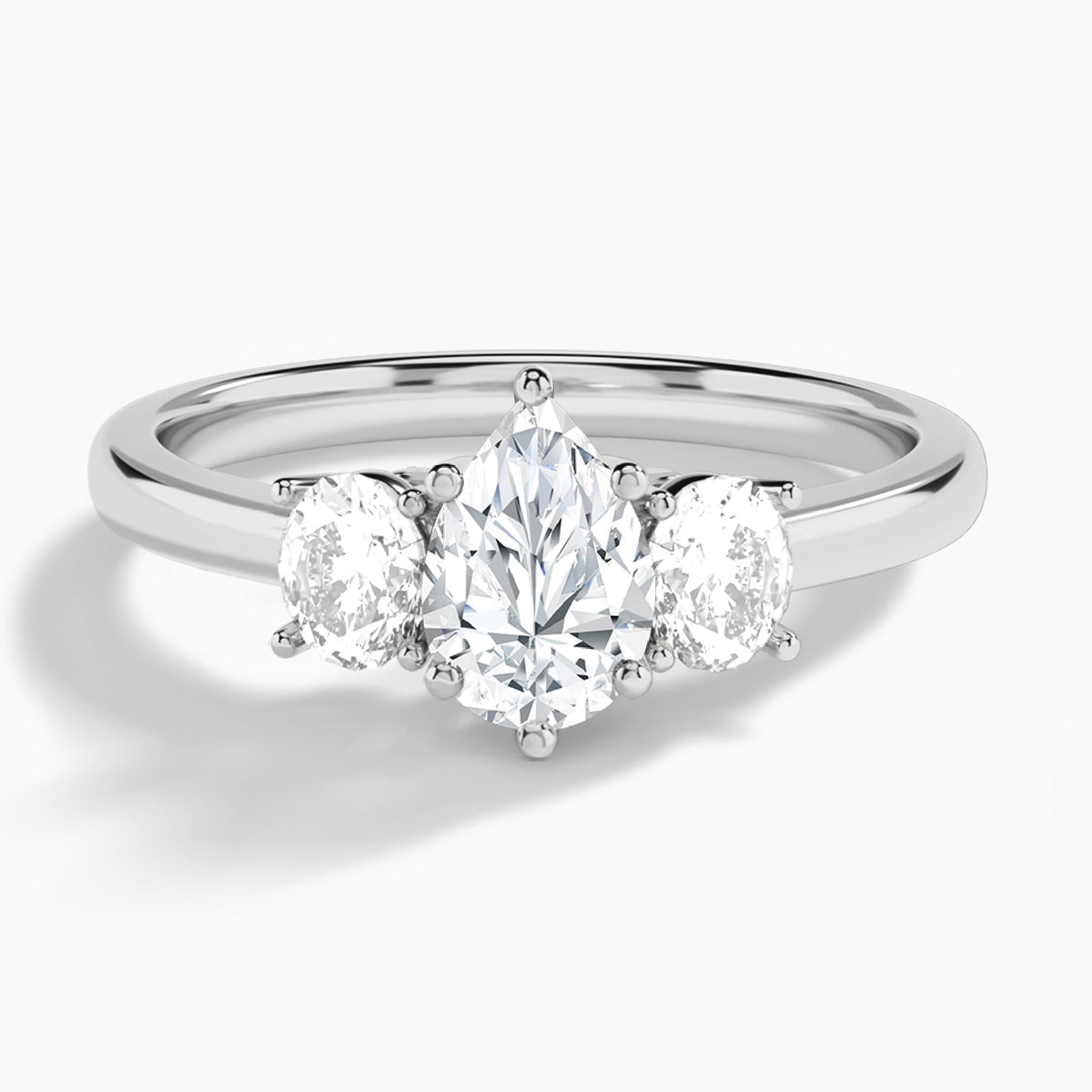 Pear Sonata Three Stone Lab Diamond Engagement Ring In 18K White Gold - Lucenjuri