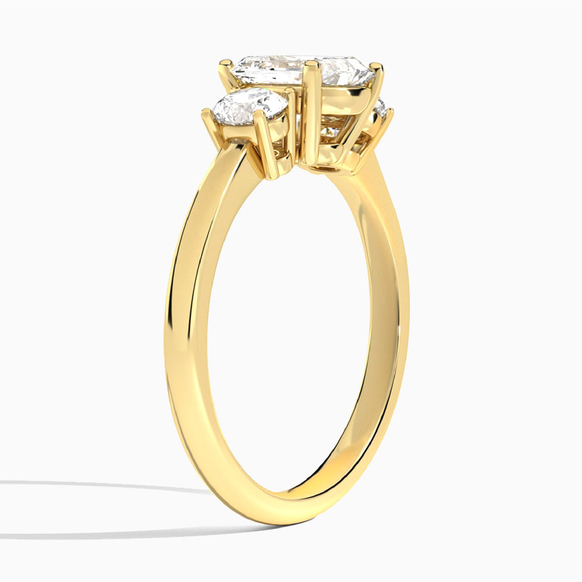 Emerald Sonata Three Stone Lab Diamond Engagement Ring In 14K Yellow Gold, Angle View