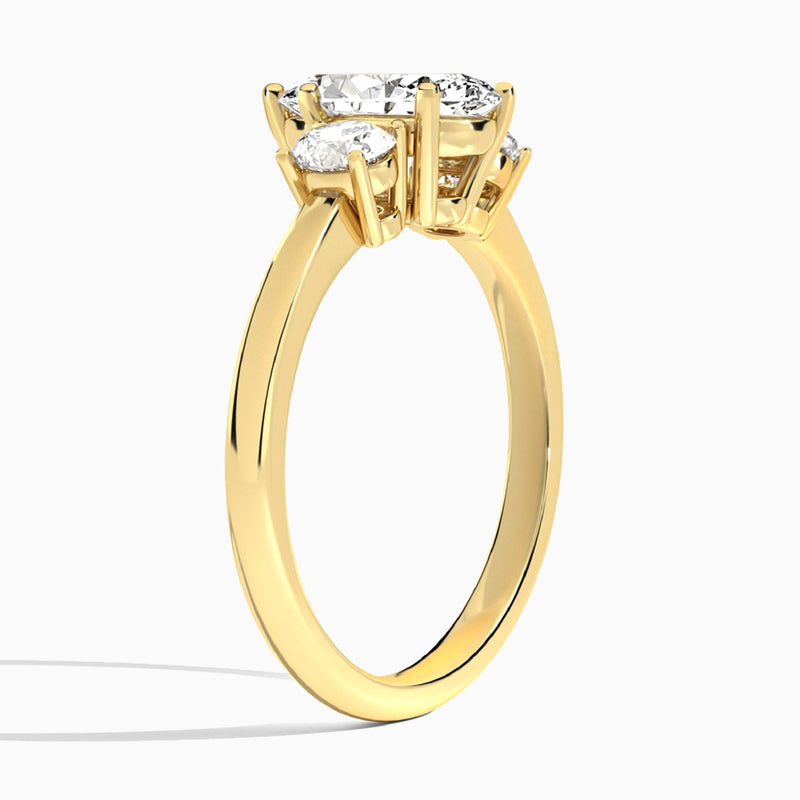 Marquise Sonata Three Stone Lab Diamond Engagement Ring In 14K Yellow Gold, Angle View