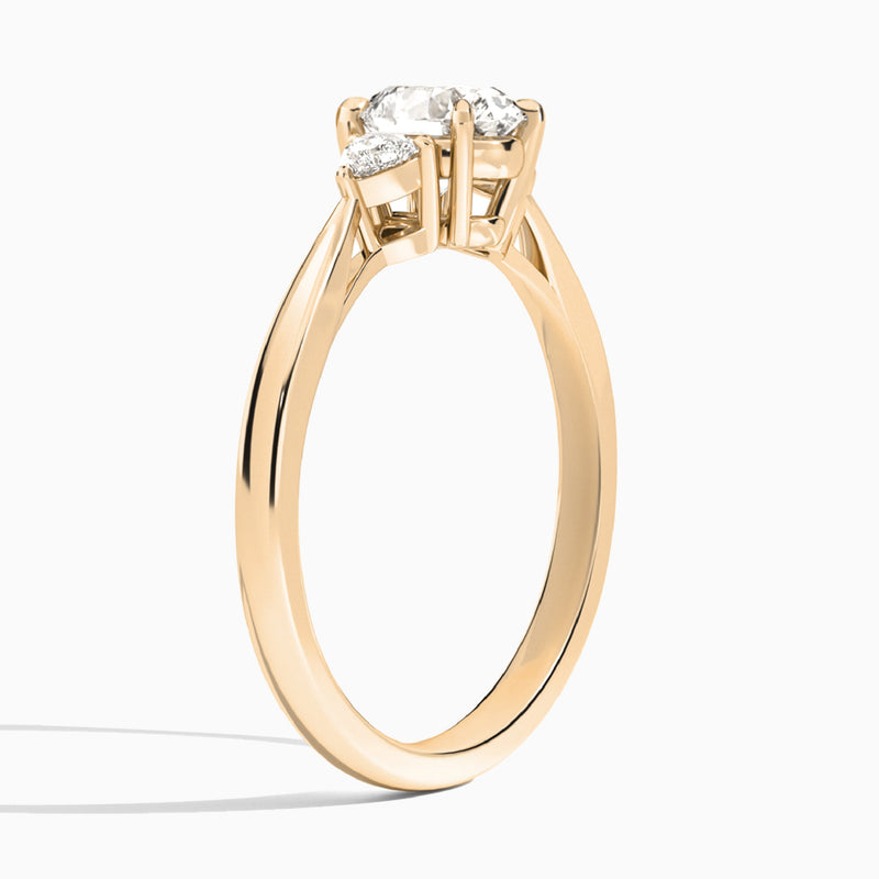 Round Trillion Cut Three Stone Lab Diamond Engagement Ring In 14K Rose Gold, Angle View