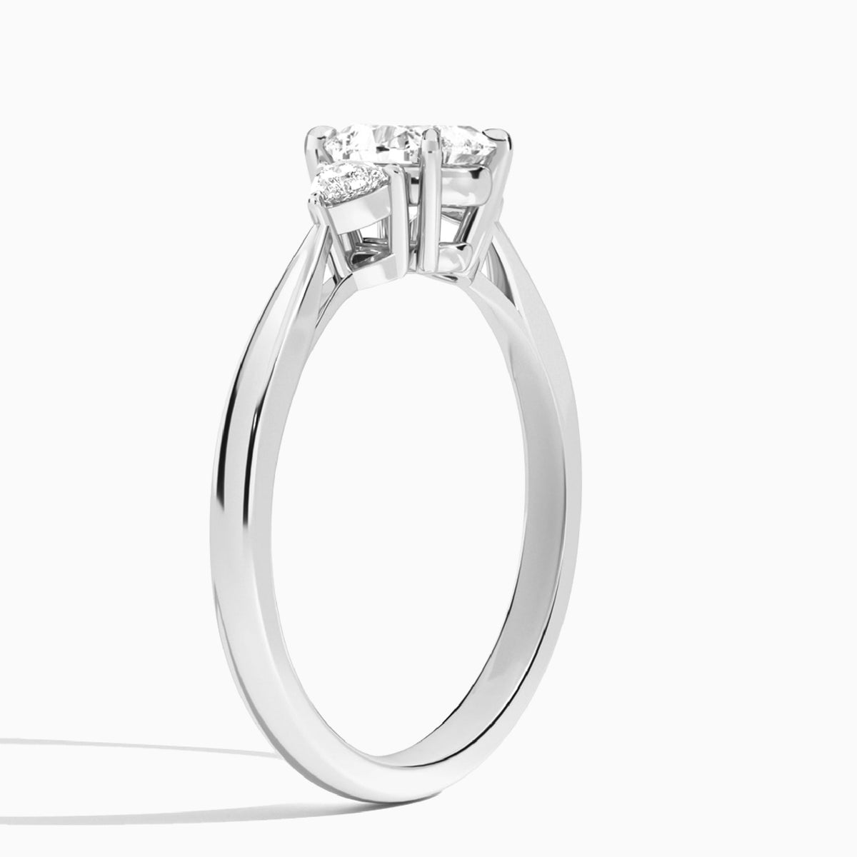Heart Trillion Cut Three Stone Lab Diamond Engagement Ring In 18K White Gold, Angle View