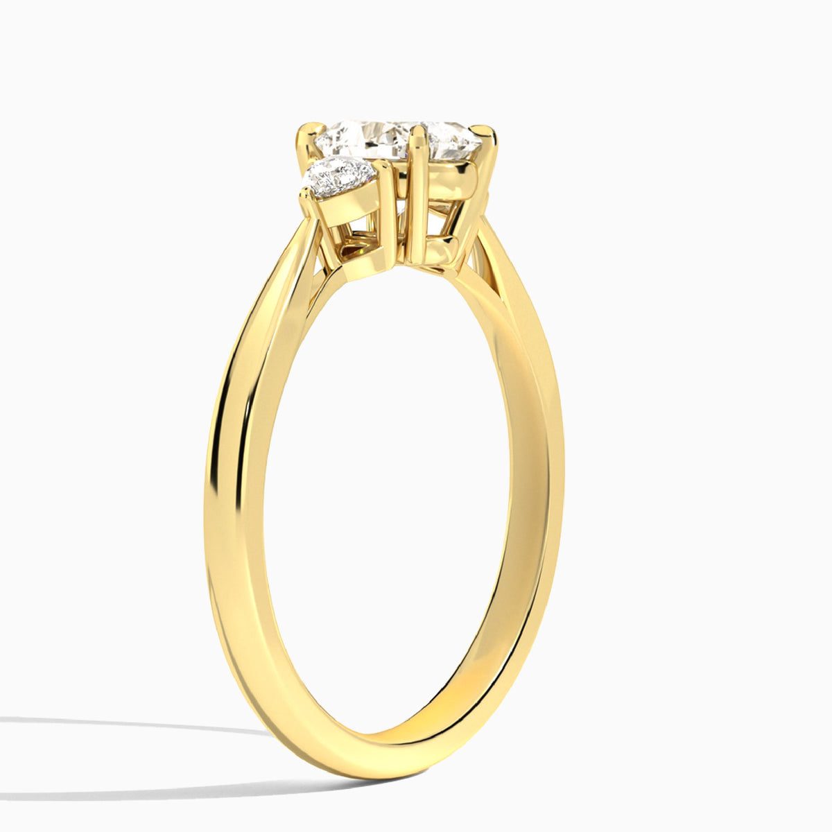 Heart Trillion Cut Three Stone Lab Diamond Engagement Ring In 18K Yellow Gold, Angle View