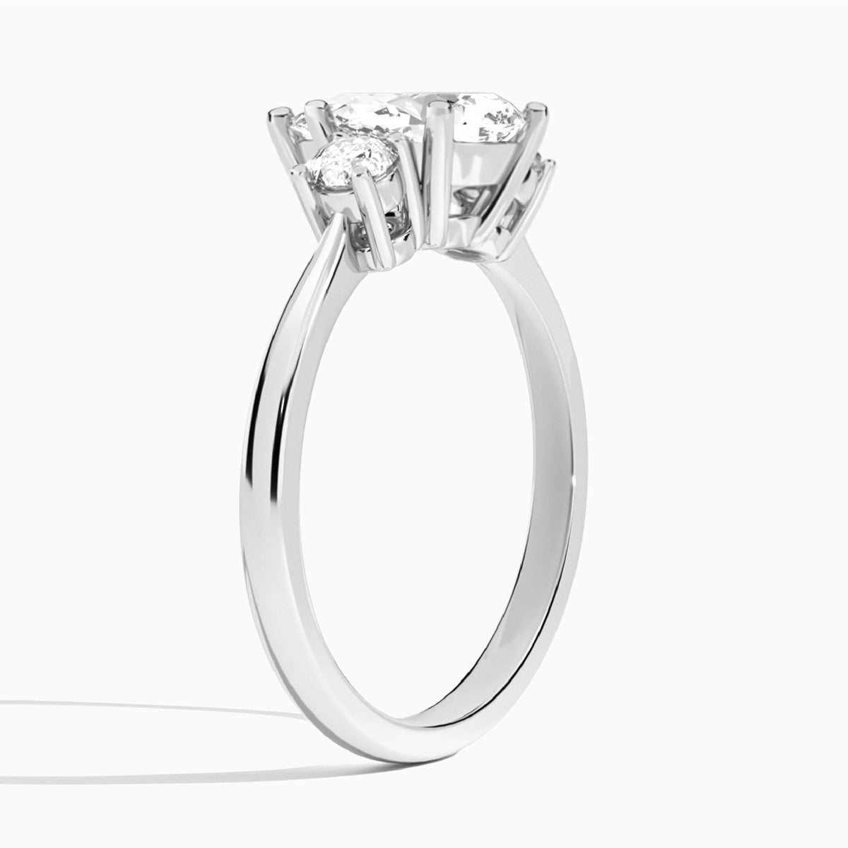 Pear Concerto Three Stone Lab Diamond Engagement Ring In Platinum, Angle View