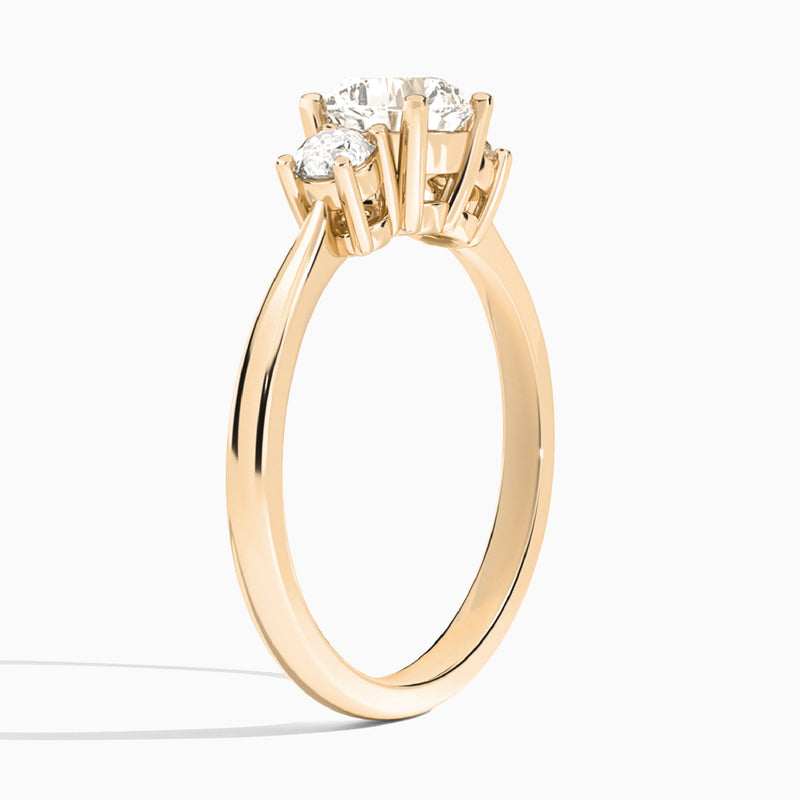 Cushion Concerto Three Stone Lab Diamond Engagement Ring In 14K Rose Gold, Angle View