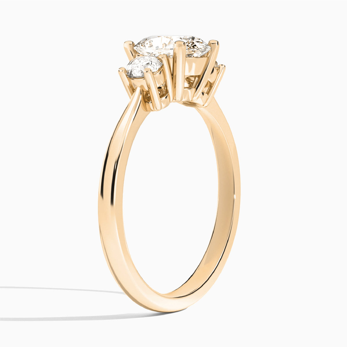 Oval Concerto Three Stone Lab Diamond Engagement Ring In 14K Rose Gold, Angle View