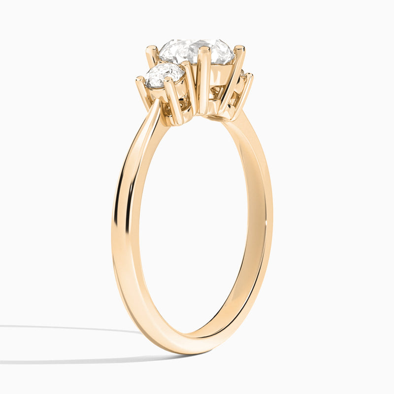 Round Concerto Three Stone Lab Diamond Engagement Ring In 14K Rose Gold, Angle View