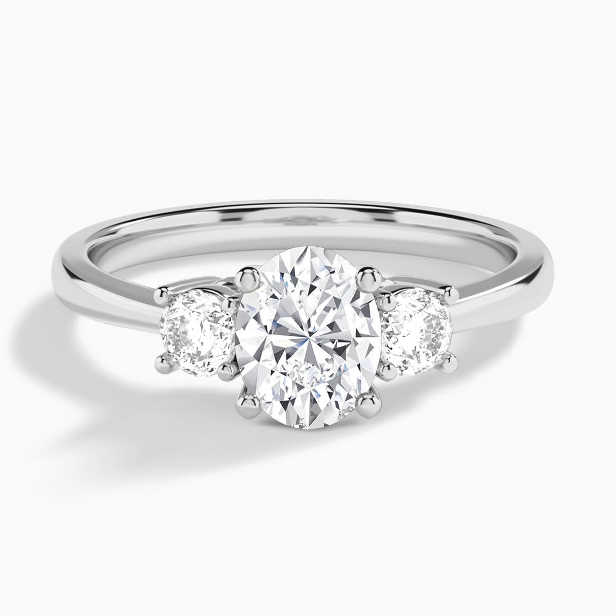 Oval Concerto Three Stone Lab Diamond Engagement Ring In 18K White Gold - Lucenjuri