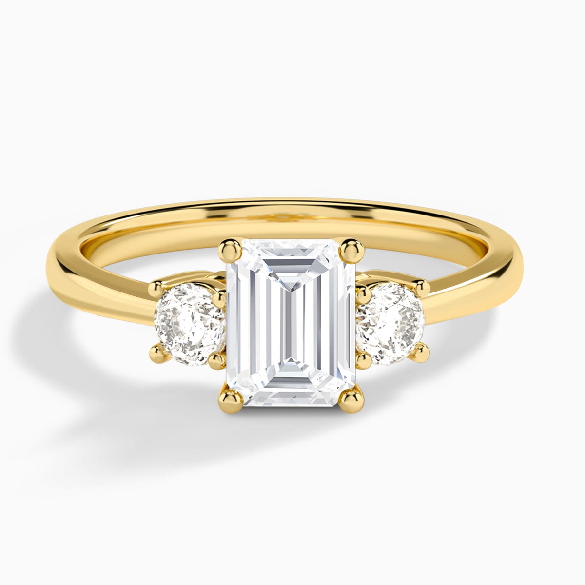 Emerald Concerto Three Stone Lab Diamond Engagement Ring In 18K Yellow Gold - Lucenjuri