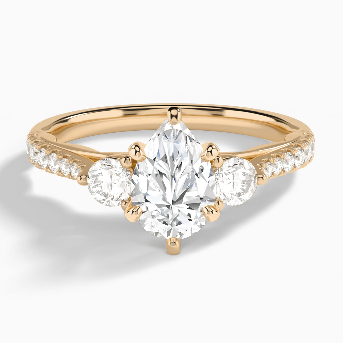 Pear Tressa Three Stone Lab Diamond Engagement Ring In 14K Rose Gold - Lucenjuri