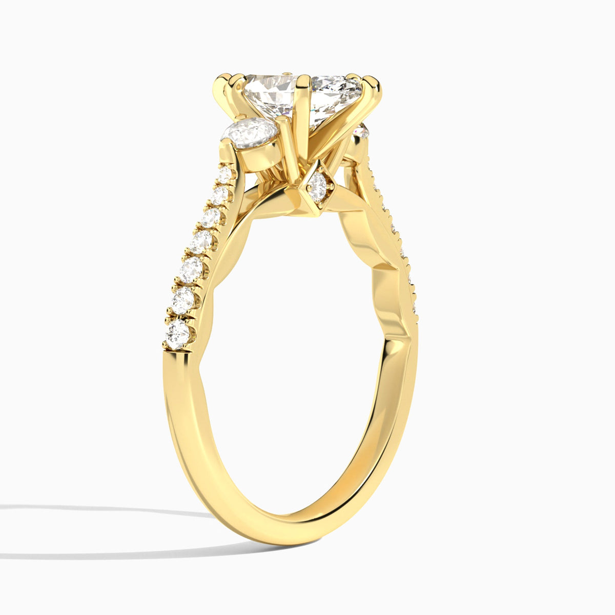 Marquise Tressa Three Stone Lab Diamond Engagement Ring In 18K Yellow Gold, Angle View